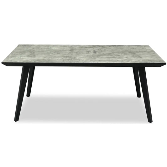 Modern nivara rectangular dining table with gray concrete top and sleek black tapered legs for stylish dining