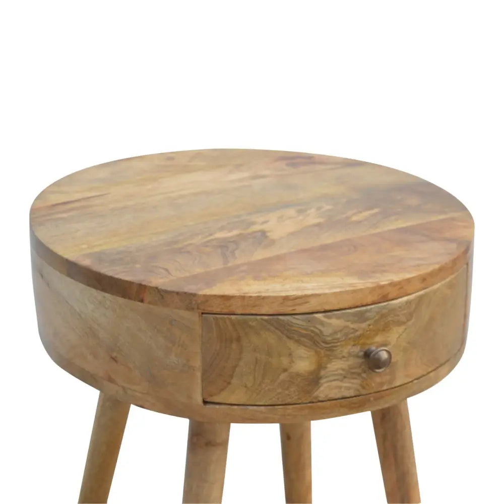 Nordic circular bedside table with round wooden top, single drawer, and natural wood grain finish for bedroom use