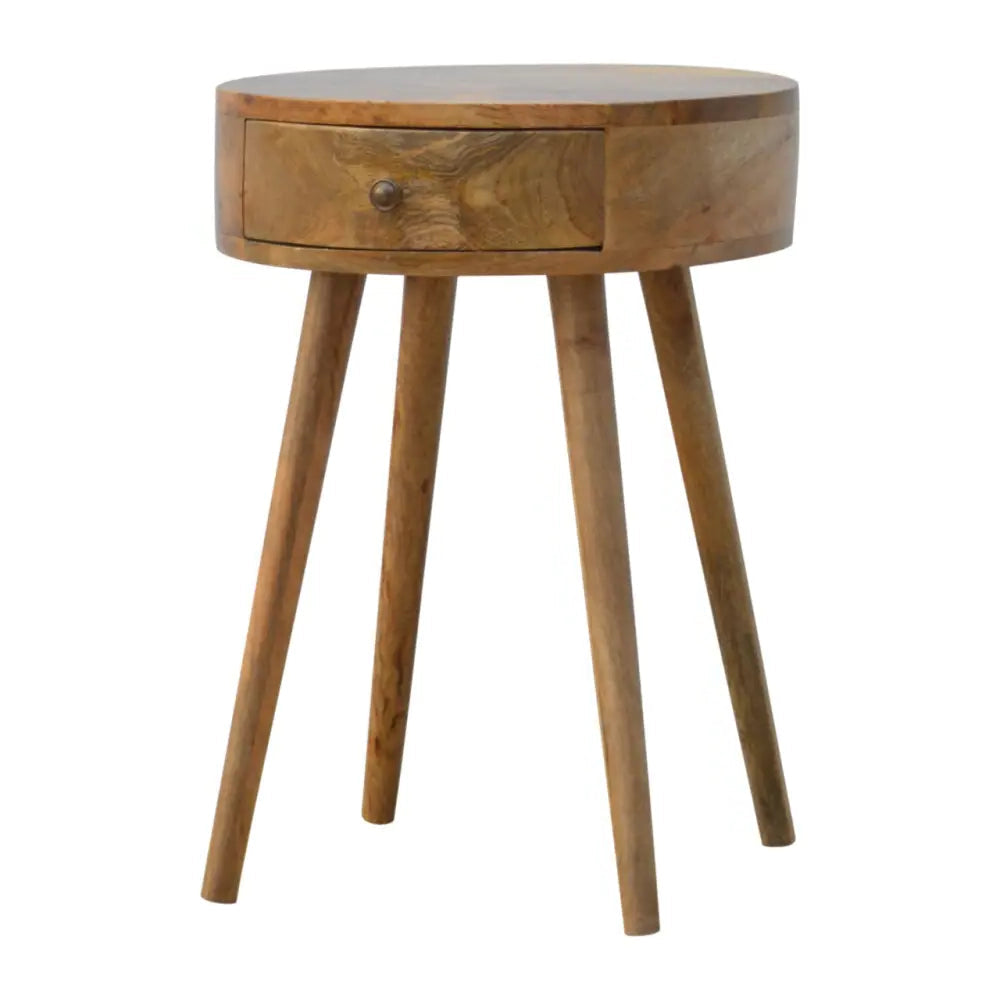 Nordic circular wooden bedside table with a round top, single drawer, and tapered legs in opulent furniture style