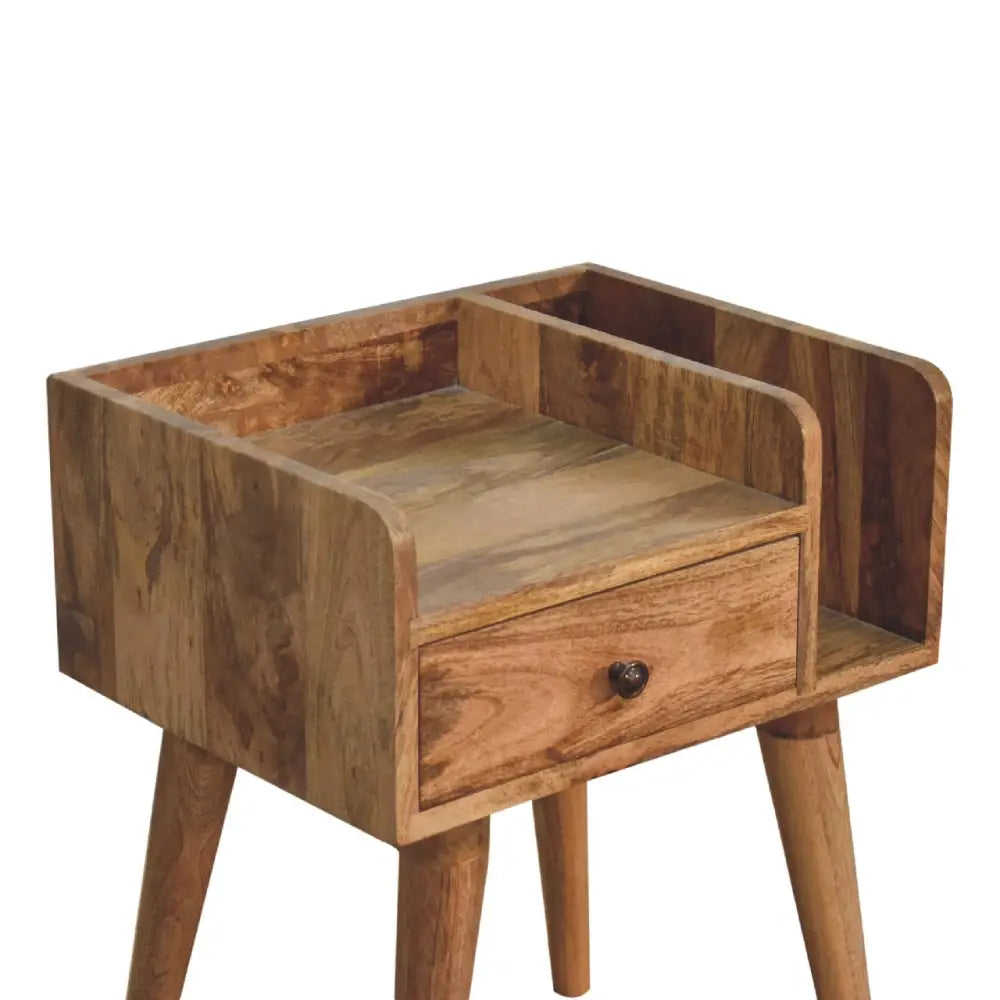 A rustic wooden nightstand with a drawer and dark metal knob for the oak-ish collective bedside collection