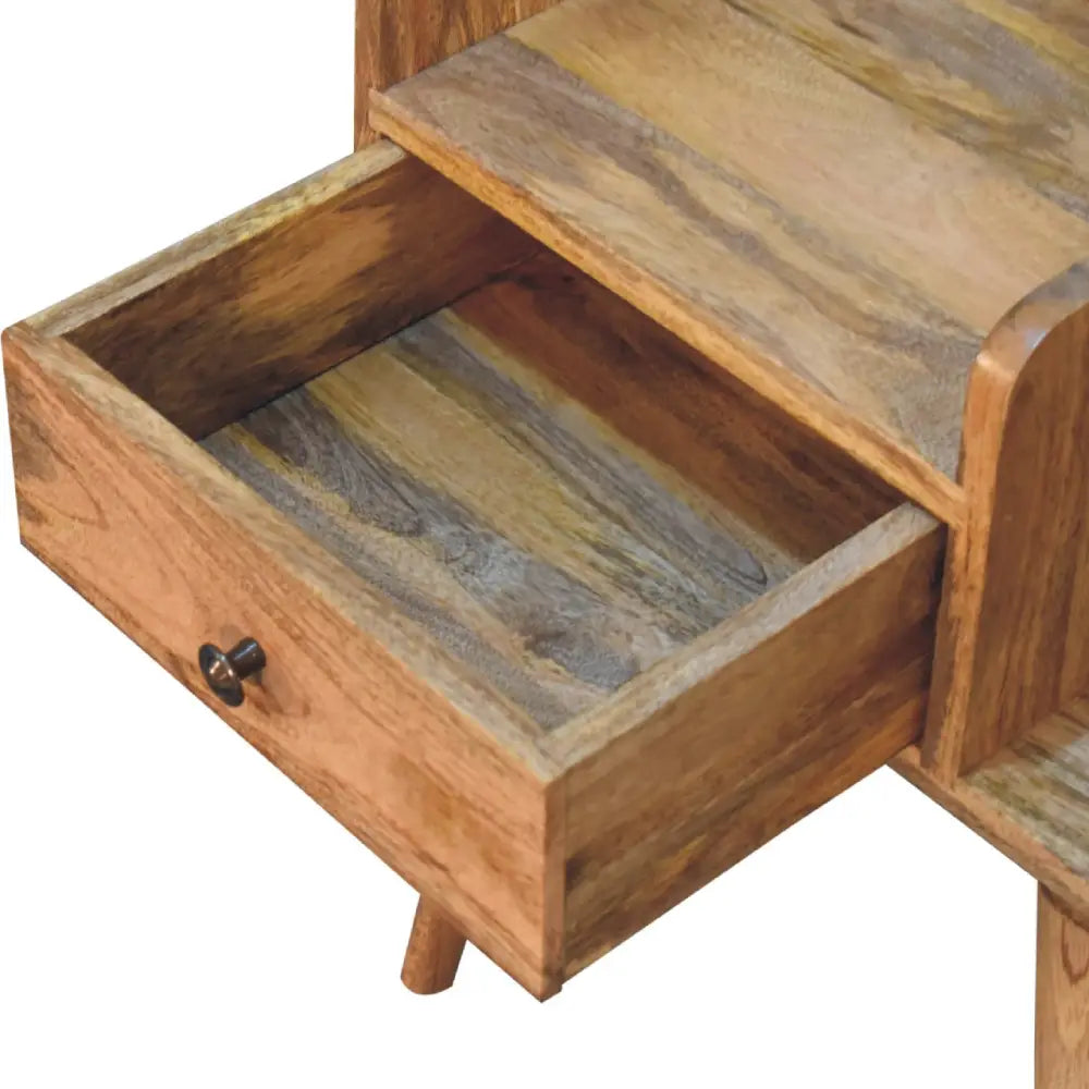 A rustic oak-ish collective bedside wooden side table with a single drawer and warm brown tones