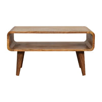 A mid-century modern media unit with a light brown wooden top and tapered legs featuring practical media unit features