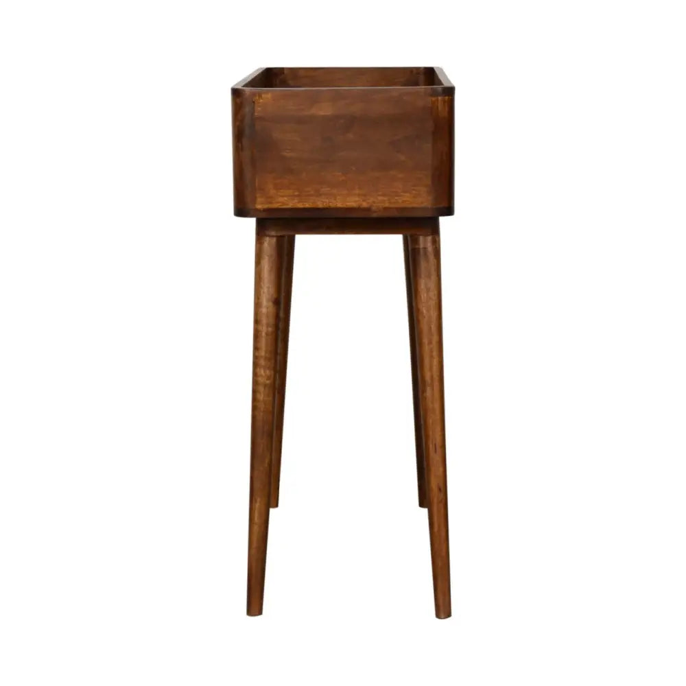 A sleek rectangular chestnut console table in dark brown wood with tapered legs and an open top design
