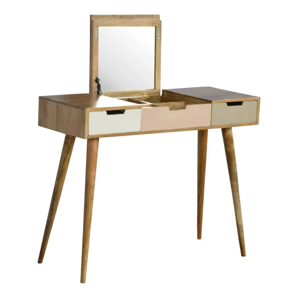 Mid-century modern pink gradient dressing table with light wood frame, white and beige drawers, and hinged mirror on top