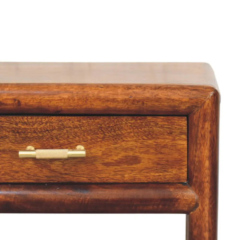 Regency chestnut nightstand in rich warm mango wood with polished brass drawer pull and textured grip