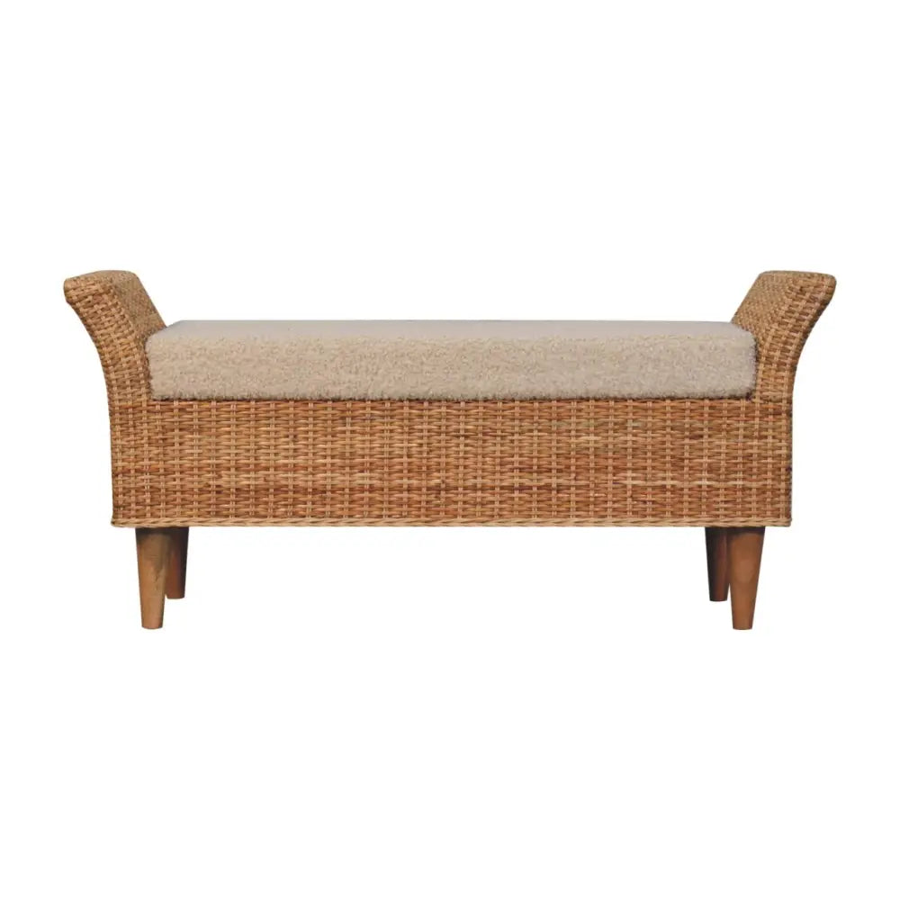 Riviera woven bench with beige upholstered seat and woven wicker frame on wooden legs perfect for indoor seating