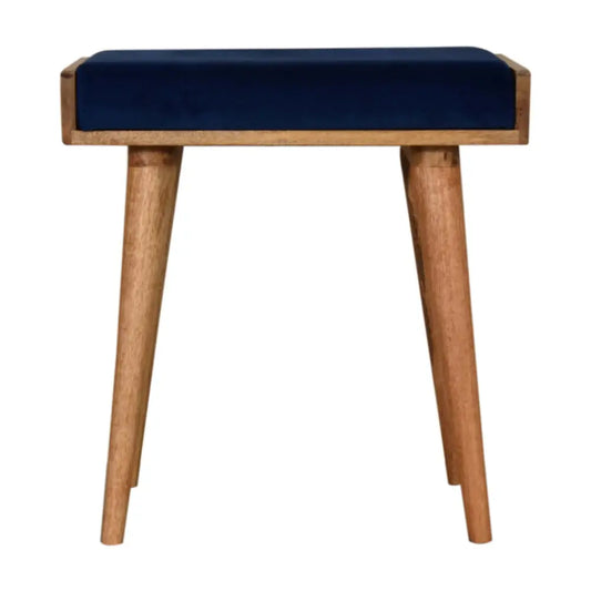 Royal blue velvet tray footstool with a navy blue cushioned seat and light wood tapered legs for stylish comfort