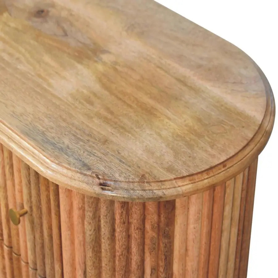 A rustic oval-top wooden sideboard with vertical slat detailing in natural finish from the soba nordic chest line