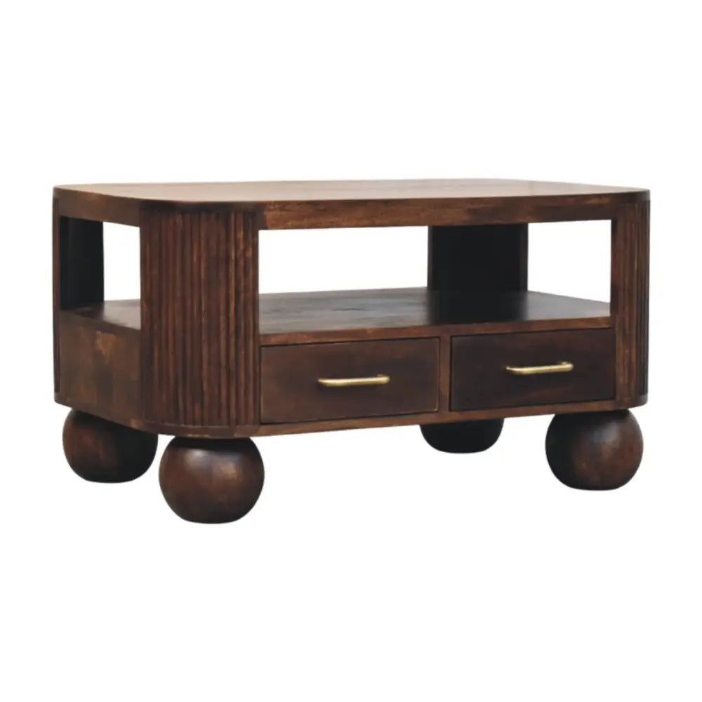 Dark brown solid mango wood sphere leg coffee table with rounded ball feet and two drawers with gold-tone handles