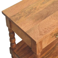 Rustic spindle side table with turned legs in warm golden teak finish made from solid mango wood