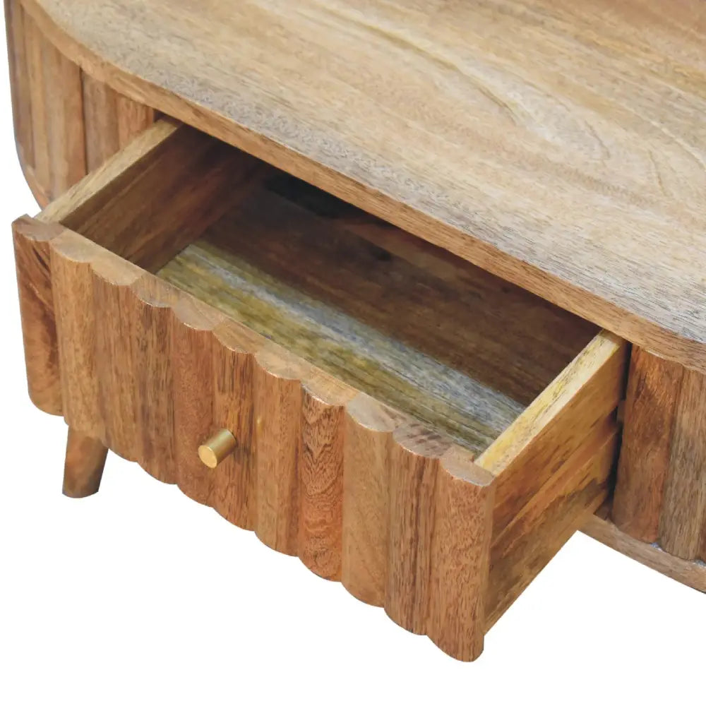 Rustic wooden stripe coffee table with scalloped drawer front and natural wood grain finish perfect for any room
