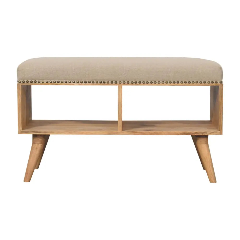 Beige studded linen open bench with wooden frame and legs featuring decorative brass nailhead trim