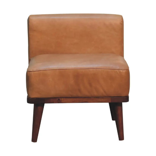 Tan buffalo leather footstool with tan leather armchair featuring wooden base and tapered legs visible from back side