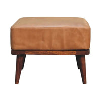 Tan buffalo leather footstool with a wooden base and tapered legs perfect as a stylish ottoman or footrest