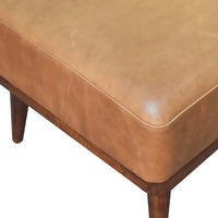 Tan buffalo leather footstool with tan leather upholstery and wooden legs perfect for living room seating
