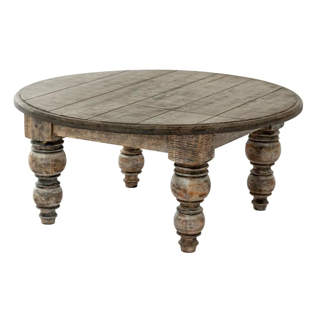 Rustic rutland collection round coffee table with weathered gray wood top and turned wooden legs