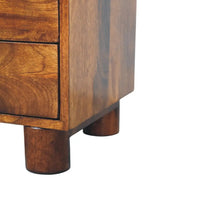 Warm-toned solid mango wood tula 2 drawer chestnut nightstand with rounded cylindrical legs for bedroom use