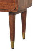 Valenza two-drawer bedside table in solid mango wood with tapered legs and brass caps in warm brown finish