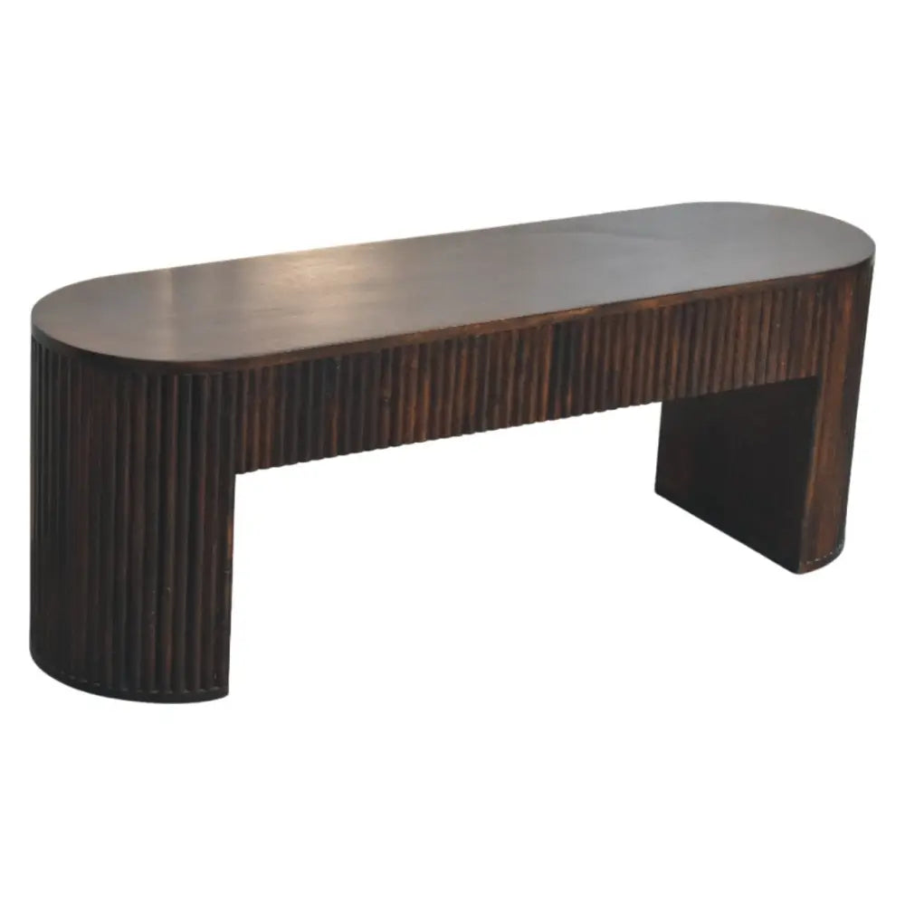 Dark brown wooden console table with oval top and vertical ribbed sides complements the velvet mocha fluted bench style