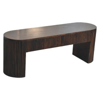 Dark brown wooden console table with oval top and vertical ribbed sides complements the velvet mocha fluted bench style