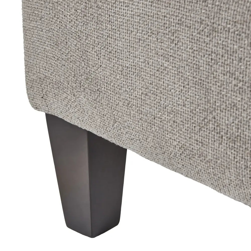 Vesper taupe ottoman foot stool with gray textured fabric and sleek black matte finish leg for stylish comfort