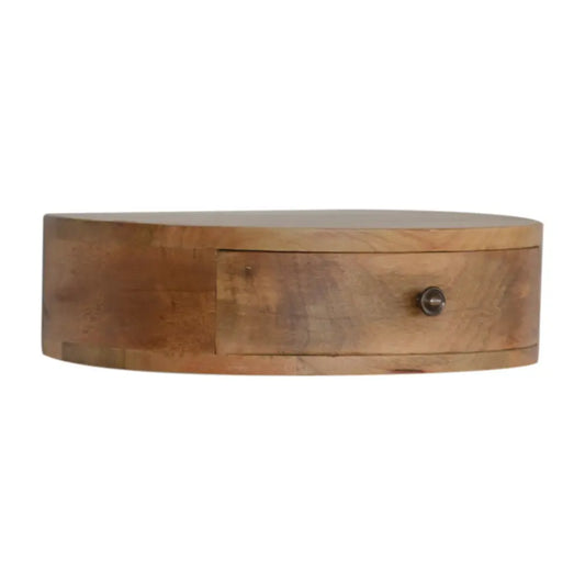 Light brown wooden wall mounted rounded bedside shelf with single drawer and metal knob for compact storage