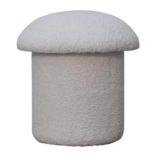 A plush white boucle mushroom footstool with soft textured fabric in an off-white color perfect for lounging