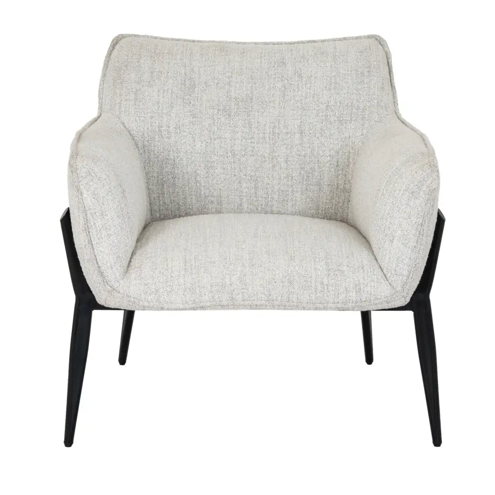 Modern zephra chair with softly contoured silhouette, light gray textured fabric upholstery, and sleek black metal legs