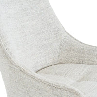 A soft light gray textured fabric zephra dining chair with a modern curved design perfect for any dining space