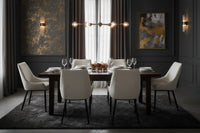 Modern zephra dining chair with textured beige fabric upholstery and sleek black metal legs for stylish dining seating